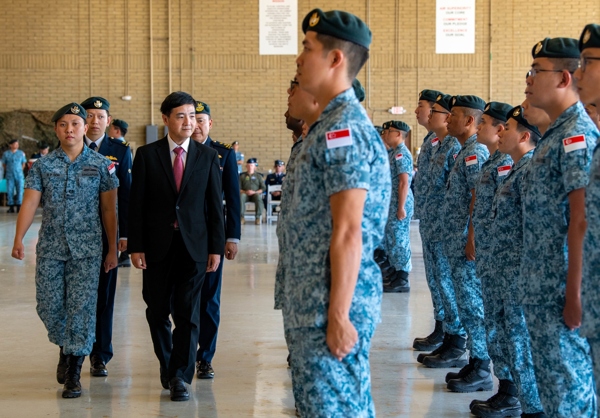 Heng Chee How, Republic of Singapore Senior Minister of State, performs a ceremonial inspection of 425th Fighter Squadron personnel during a parade ceremony, April 25, 2023, at Luke Air Force Base, Arizona.