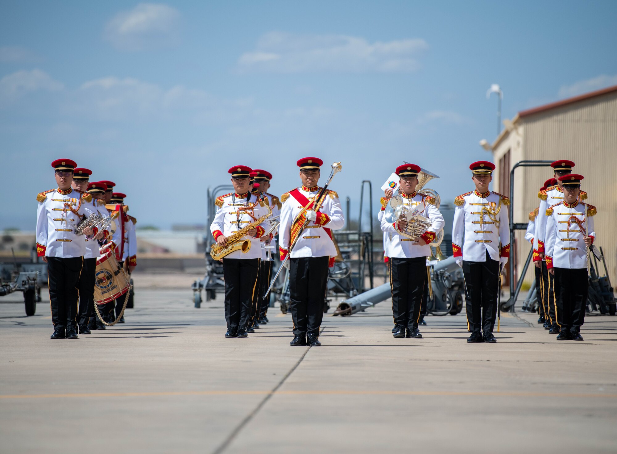 The Singapore Armed Forces Central Band prepares to perform for the Republic of Singapore Air Force Peace Carvin II 30th Anniversary celebration parade April 25, 2023, at Luke Air Force Base, Arizona.