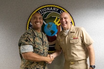 U.S. Marine Corps Lt. Gen. Brian W. Cavanaugh, the commanding general of Fleet Marine Force, Atlantic, Marine Forces Command, Marine Forces Northern Command, greets Expeditionary Warfare Training Group, Atlantic leadership EWTGLANT, Virginia, April 27, 2023. Cavanaugh spoke with Expeditionary Warfare Training Group, Atlantic leadership after inspecting a Long Range Unmanned Surface Vessel. The LRUSV is semiautonomous vessel that will primarily serve as an intelligence, surveillance and reconnaissance platform. (U.S. Marine Corps photo by Sgt. Kealii De Los Santos)