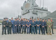 The multinational Commander, Task Group (CTG) Integrated Air and Missile Defense (IAMD) staff embarked aboard Spanish Navy Álvaro de Bazán-class frigate ESPS Blas de Lezo (F-103) in support of exercise Formidable Shield pose for a photo on the pier in Ferrol, Spain, April 28, 2023. Formidable Shield is a biennial exercise involving a series of live-fire events against subsonic, supersonic, and ballistic targets, incorporating multiple Allied ships, aircraft, and ground forces working across battlespaces to deliver effects.