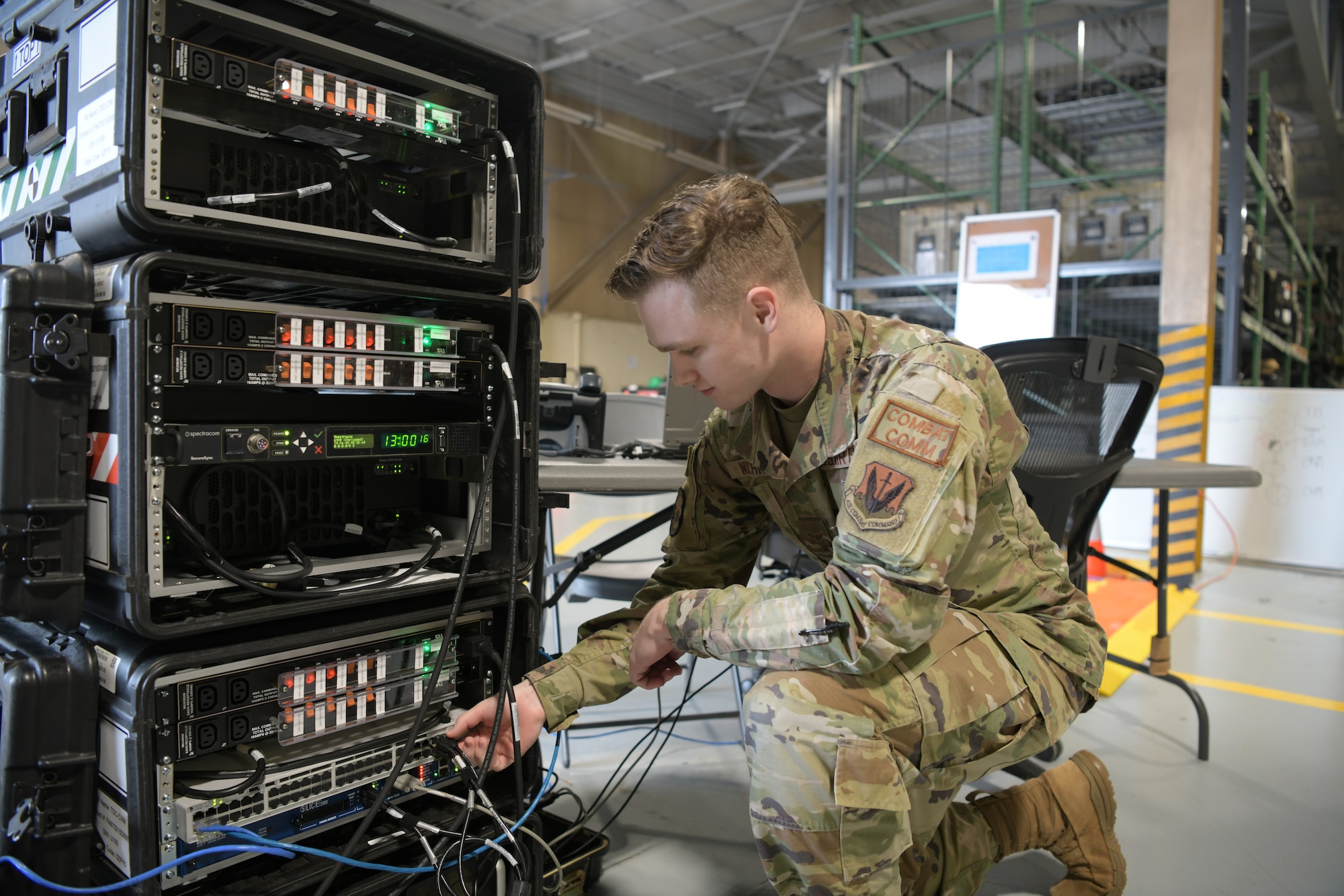 Airman kneeling