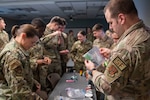 Ohio Air National Guard Airmen assigned to the 180th Fighter Wing Security Forces Squadron took part in counter-narcotics training with the Defiance Police Department at the 180th Fighter Wing in Swanton, Ohio, March 4, 2023. Airmen learned about various illegal drugs, how they can be concealed, and methods of detection and identification.