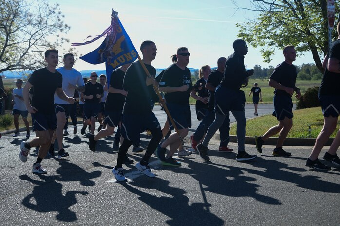 Airmen participate in a 4.27 kilometer remembrance run on Beale Air Force Base, California, on April 27, 2023.