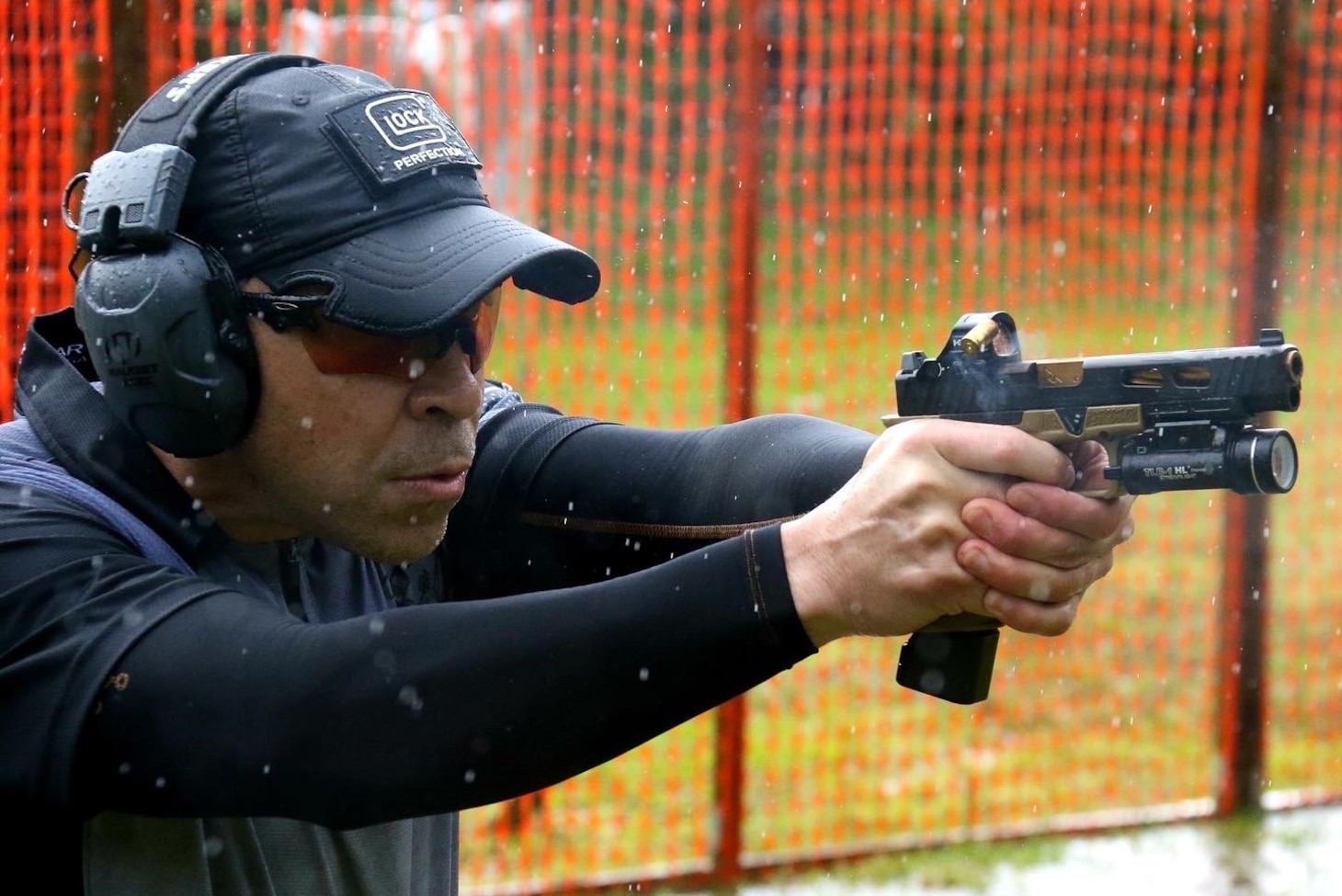 Hospital Corpsman 1st Class Axel Narvaez, a native of Vega Baja, Puerto Rico, competes under the carry optics division for pistols during the Caribbean Open 2022, Feb. 6, 2022.