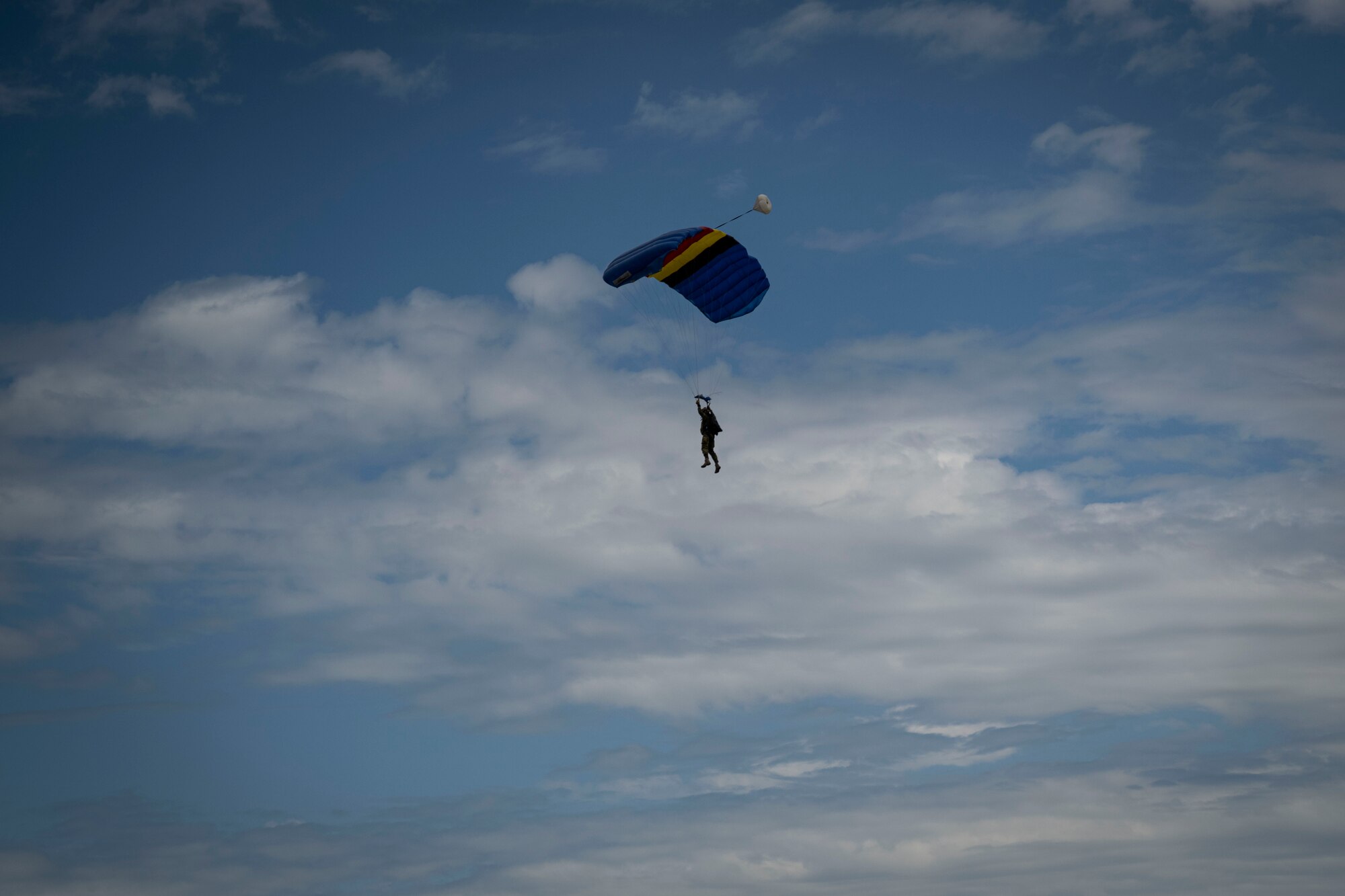 A member of the Belgian Special Operations Regiment conducts a military free fall jump during exercise Southern Strike near Gulfport Mississippi, April 24, 2023. Southern Strike promotes interoperability between special forces, conventional ground forces and air assets to ensure the U.S. military stays relevant and ready to respond to a peer-to-peer large scale combat operation.