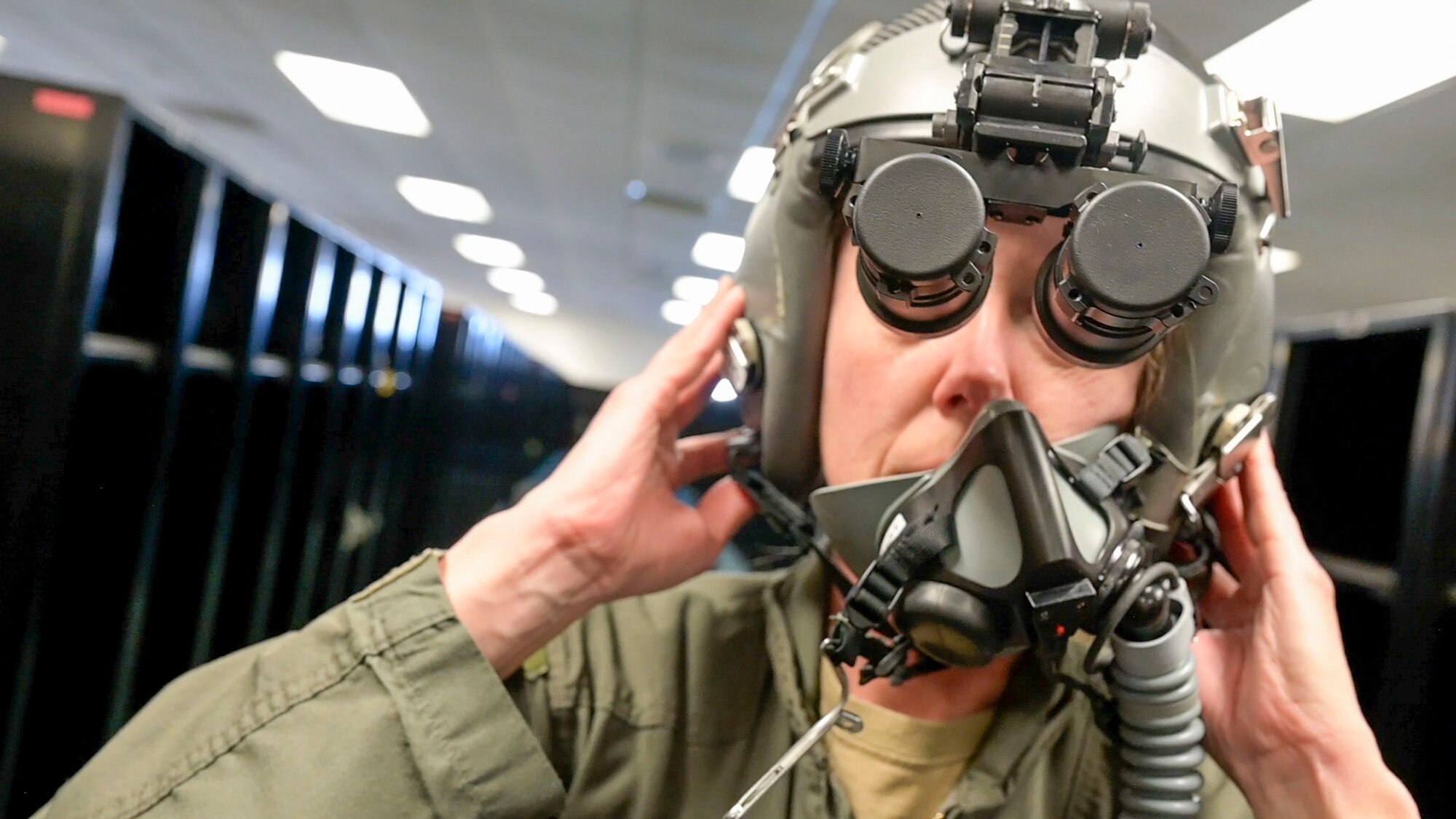 Jessica "Sting" Peterson, Technical Director, 412th Operations Group tests the safety equipment needed before an aerial refueling mission at Edwards Air Force Base, Calif.  There is a critical need to test at operationally representative conditions and to test at specific environmental conditions with flight test equipment.