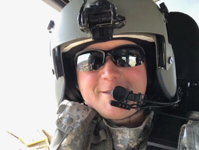 (Photo courtesy Capt. Veronica Jones) Capt. Veronica Jones Pilots her Lakota Helicopter in the National Guard.