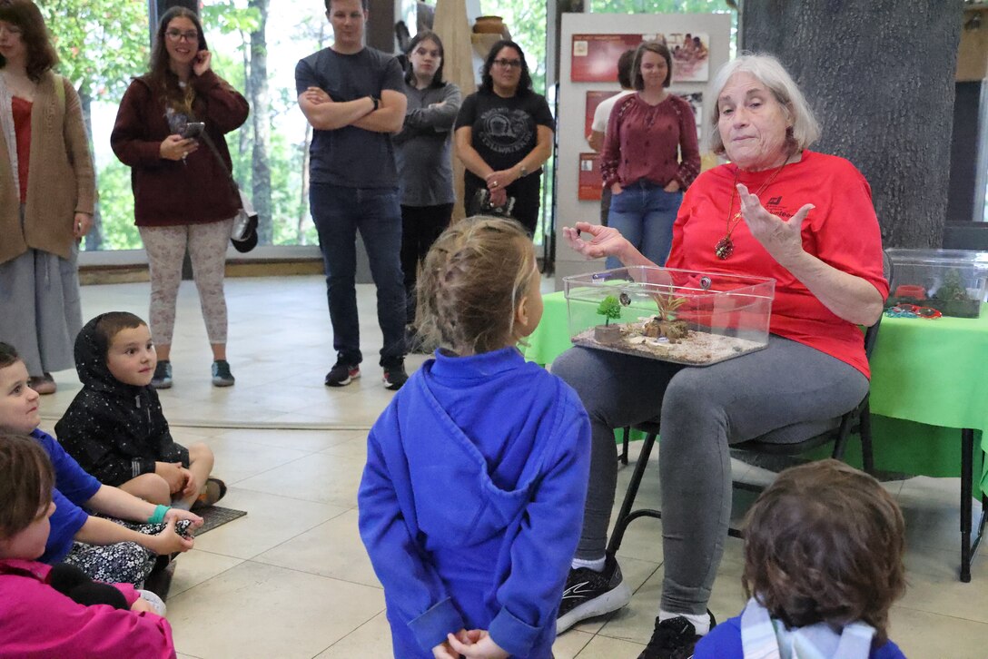 Kathy Short, a volunteer at Carters Lake, speaks to pre-school students about spiders at the new Carters Lake Nature Center in Carters Lake, Georgia, April 28, 2023. Carters Lake rededicated the center with new state of the art equipment and technology, allowing for a more enjoyable and interactive experience for the visitor.