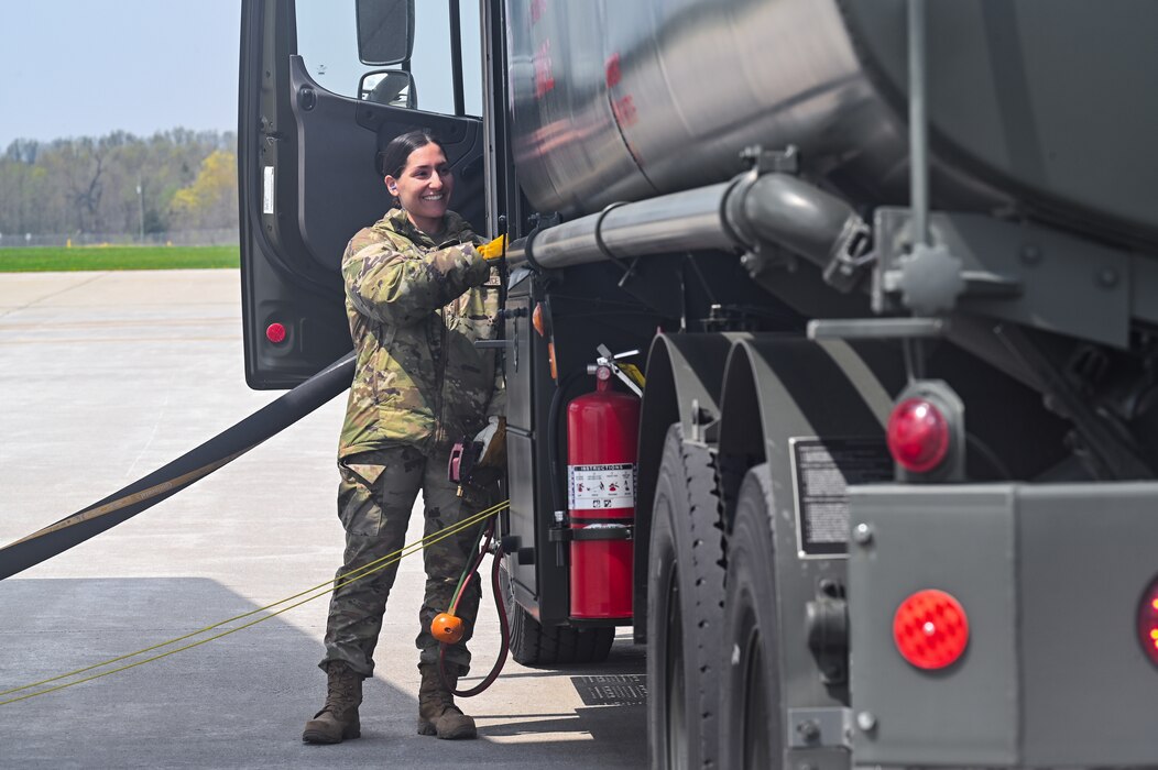 Senior Airman Victoria Russo, a fuels specialist assigned to the 910th Logistics Readiness Squadron, monitors the refueling of a C-130H Hercules aircraft on April 25, 2023, at Youngstown Air Reserve Station, Ohio.