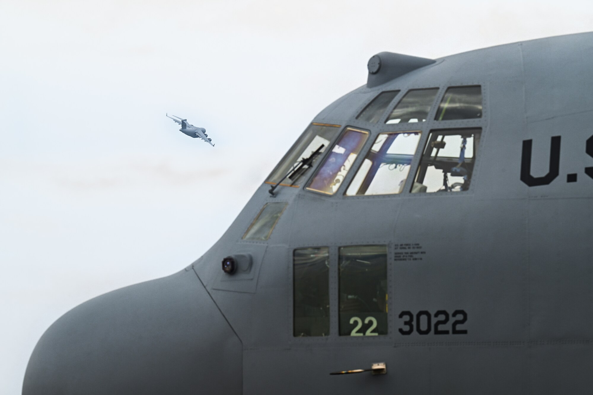A C-17 Globemaster III aircraft assigned to the 911th Airlift Wing, Pittsburgh, flies over Youngstown Air Reserve Station on April 25, 2023.