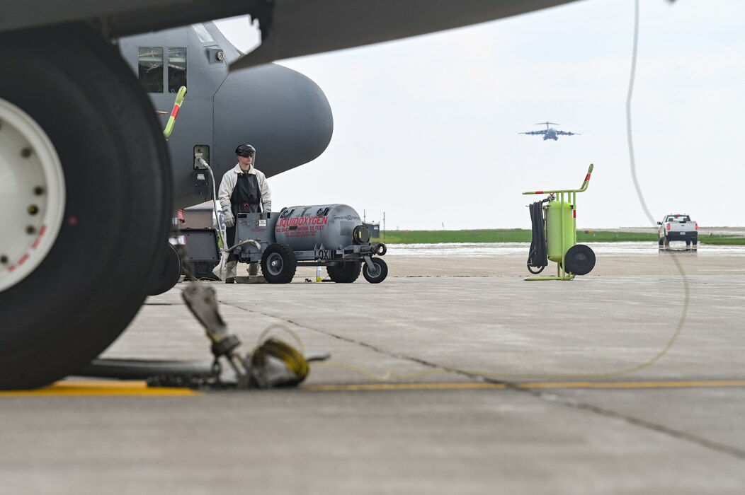 Senior Airman Creston Shirey, an aerospace maintenance specialist assigned to the 910th Maintenance Squadron, refills a C130H Hercules aircraft with liquid oxygen on April 25, 2023, at Youngstown Air Reserve Station, Ohio.