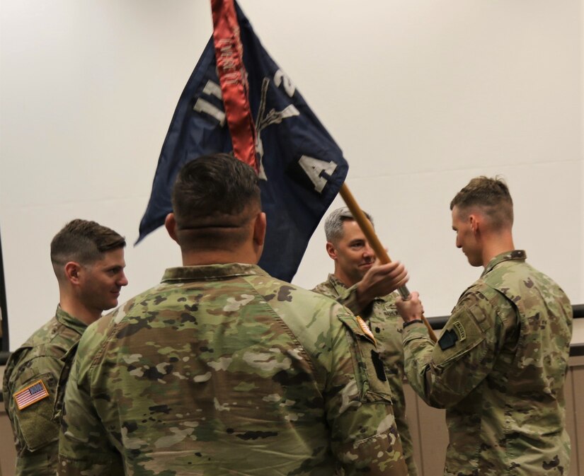 During a change of command at Ft. Indiantown Gap on April 28, 2023, Lt. Col Eric Ponzek, Commander of the 2nd Battalion, 112th Infantry Regiment, 56th Stryker Brigade Combat Team, 28th Infantry Division, Pennsylvania Army National Guard passes the guidon to Capt. John “Jack” Kerwin signifying the transfer of command for Arrow Company.