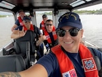 Petty Officer 1st Class Hannah Hall poses with her crew from Coast Guard Station Georgetown, South Carolina, before leaving the dock for a recent law enforcement patrol. Hall is Coast Guard’s 2022 Reserve Enlisted Person of the Year due to her superior leadership and performance.