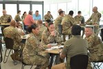Col. Jose Jimenez, Inter-American Air Forces Academy commandant, offers personal advice during a speed-mentoring session, Friday, at Joint Base San Antonio-Kelly.