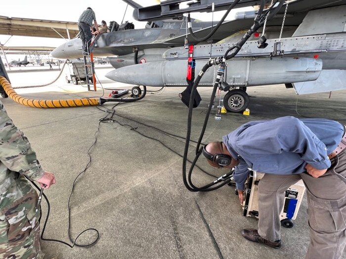 Men near aircraft