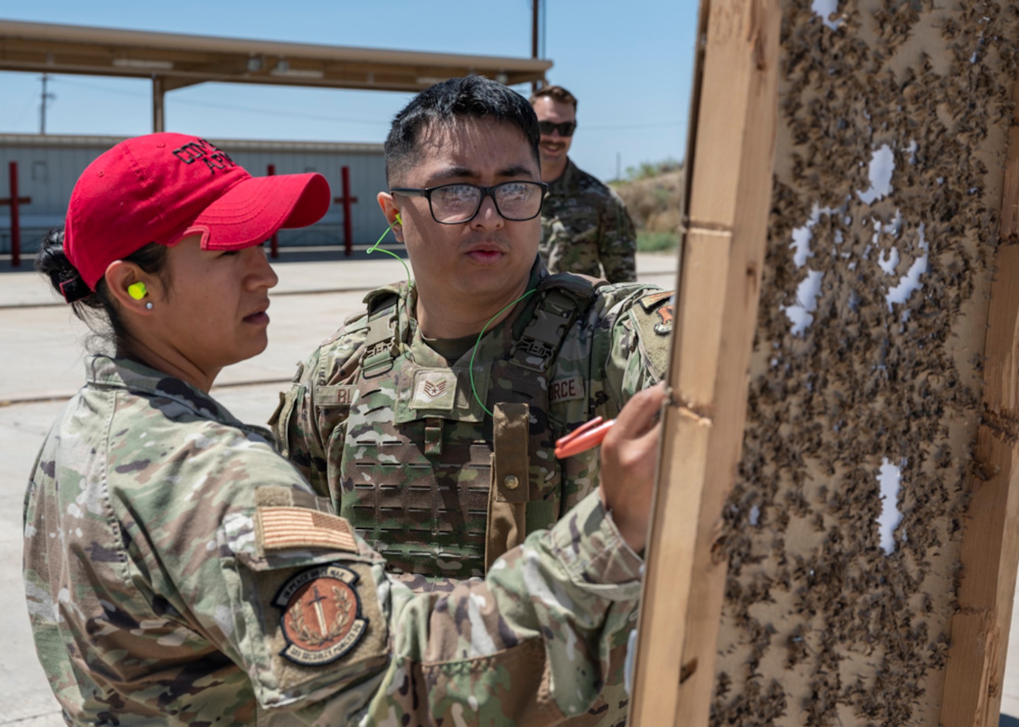 A photo of Airmen training firearms proficiency