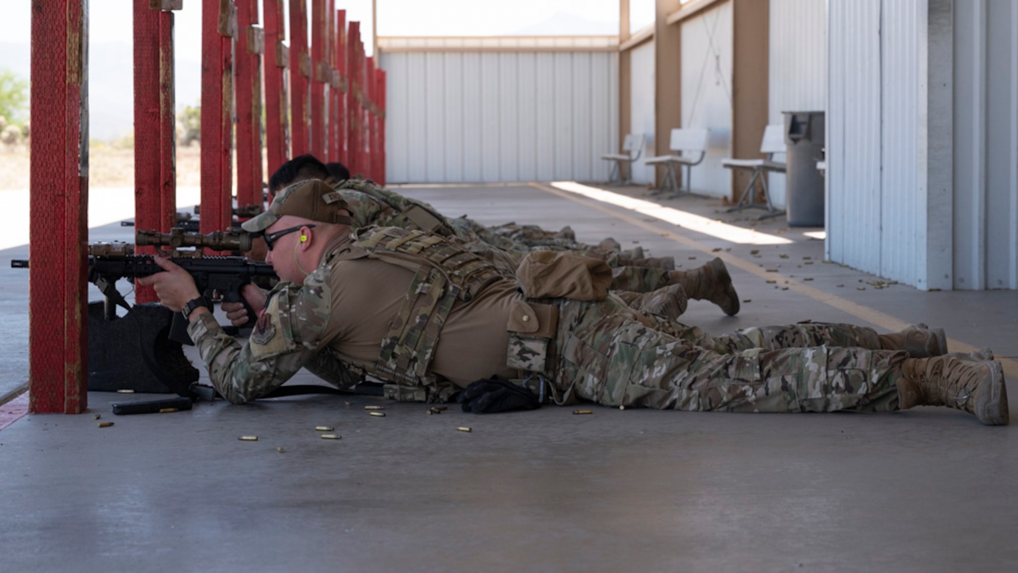A photo of Airmen training firearms proficiency