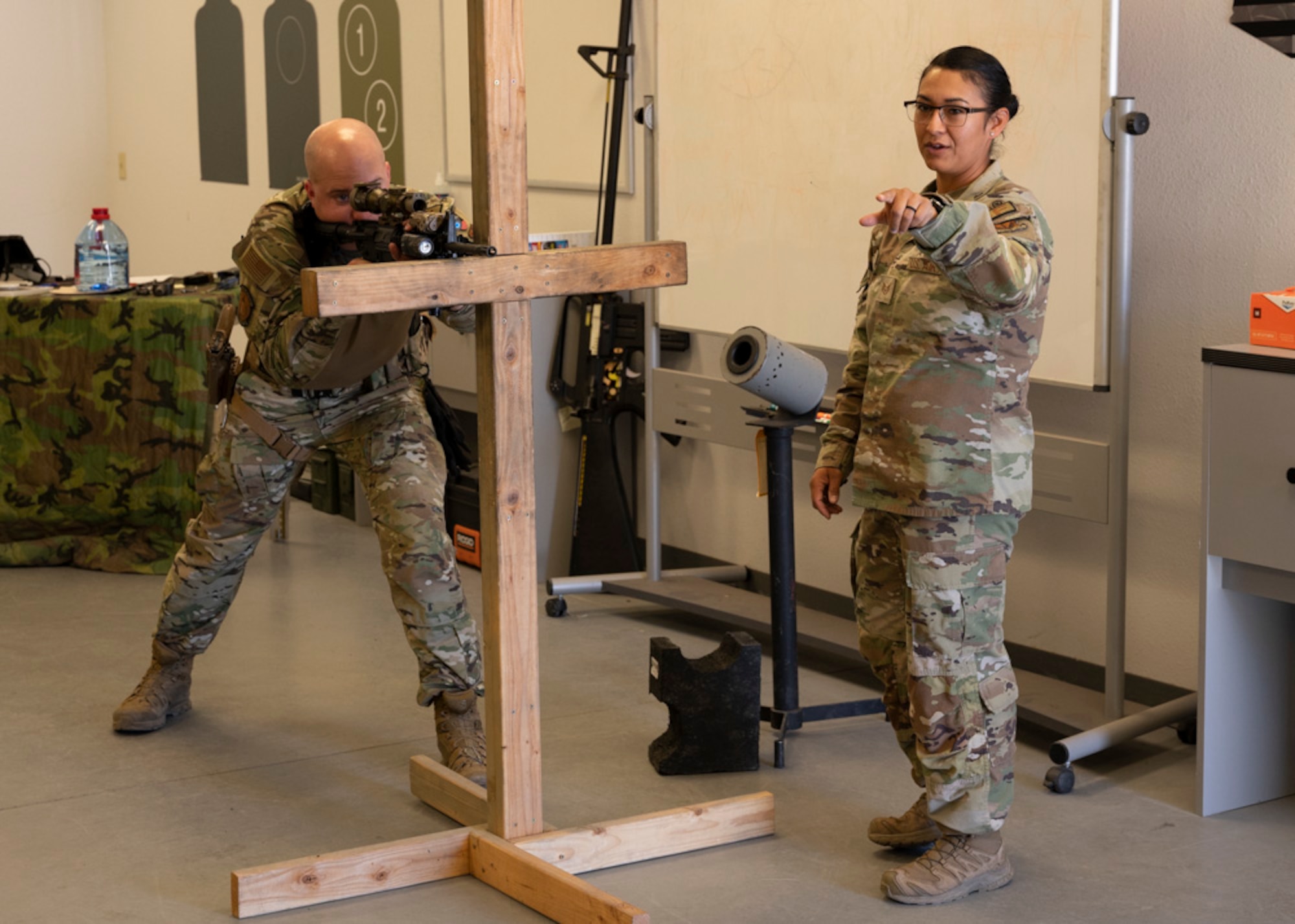 A photo of Airmen training firearms proficiency
