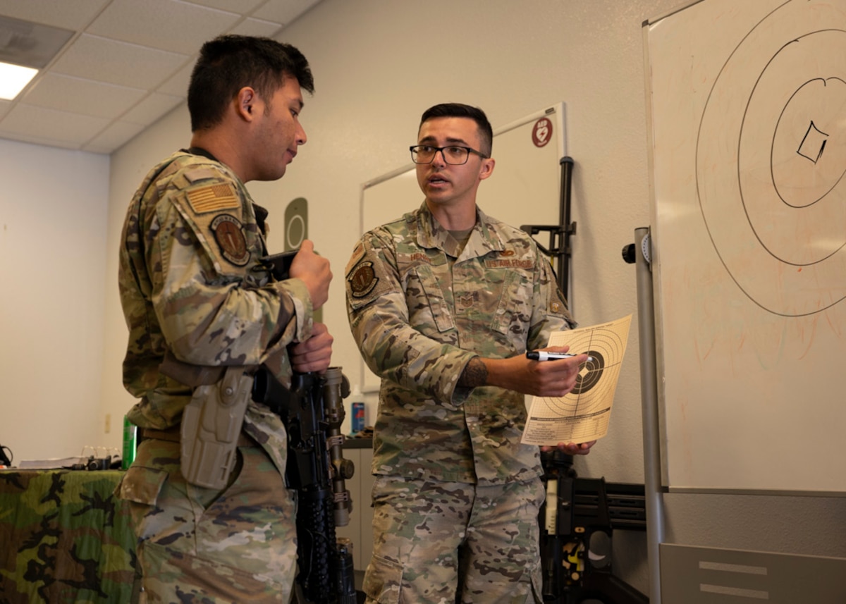 A photo of Airmen training firearms proficiency