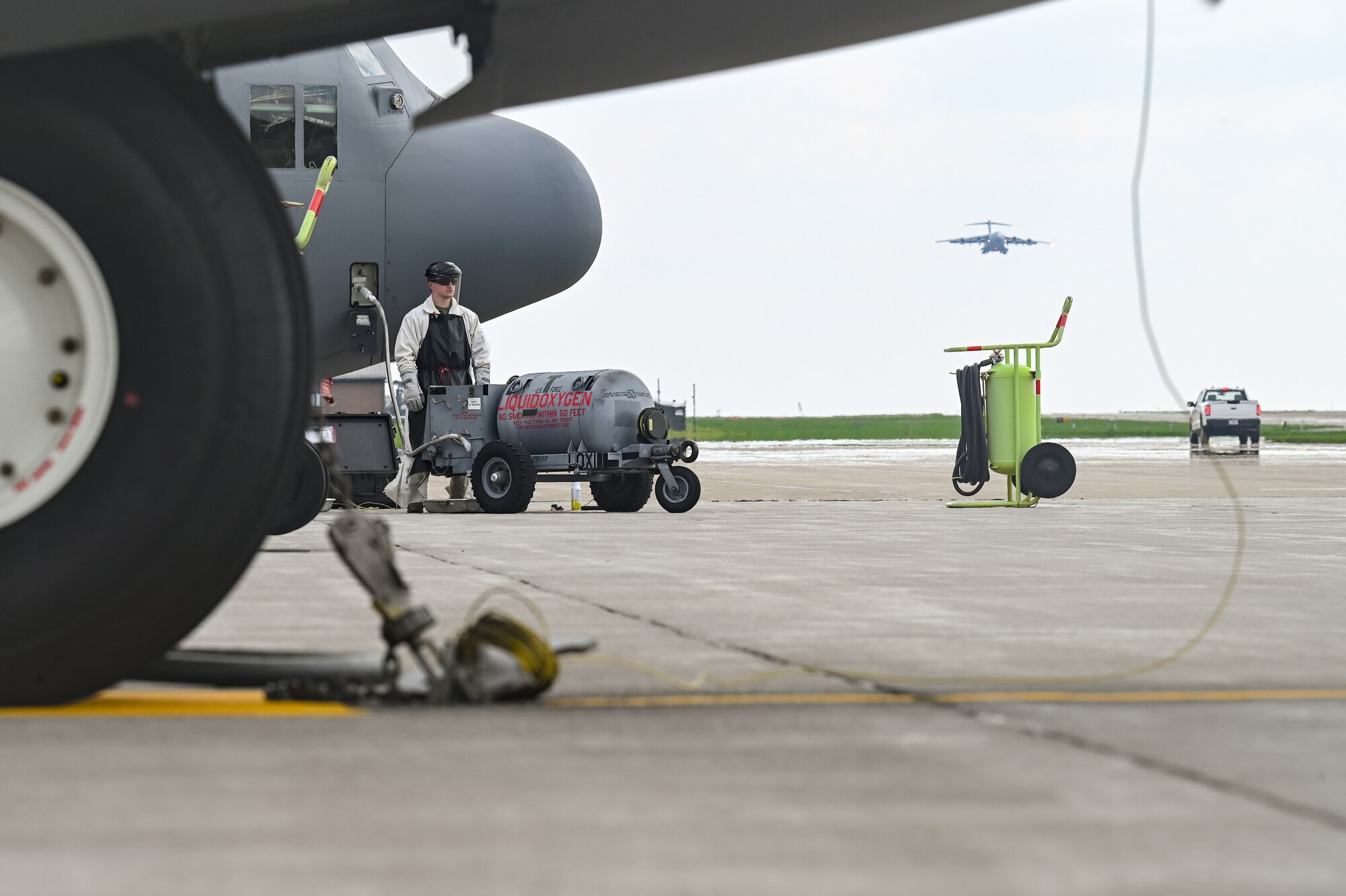 Senior Airman Creston Shirey, an aerospace maintenance specialist assigned to the 910th Maintenance Squadron, refills a C130H Hercules aircraft with liquid oxygen on April 25, 2023, at Youngstown Air Reserve Station, Ohio.