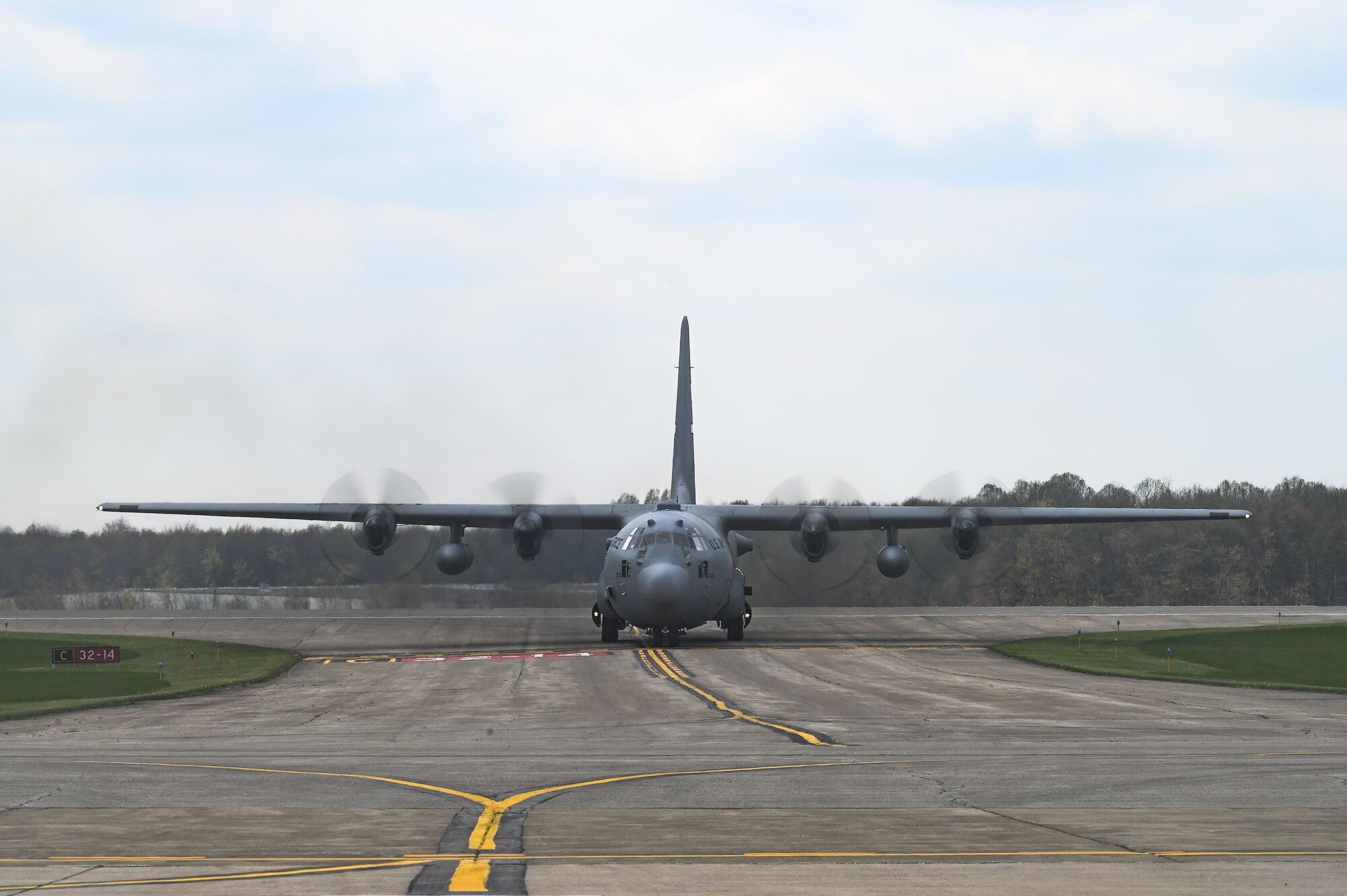 A C-130H Hercules aircraft assigned to the 910th Airlift Wing taxis on April 25, 2023, at Youngstown Air Reserve Station, Ohio.