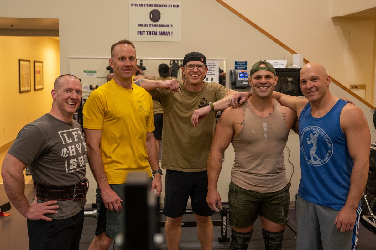 Members from the 934th and 133rd Airlift Wings pose for a picture after completing the strongman competition at the fitness center on Minneapolis-St. Paul Air Reserve Station, Minnesota, on April 20, 2023. The strongman competition had the competitors participate in 11 events over two days, consisting of various physically strenuous events. (U.S. Air Force photo by Senior Airman Matthew Reisdorf)