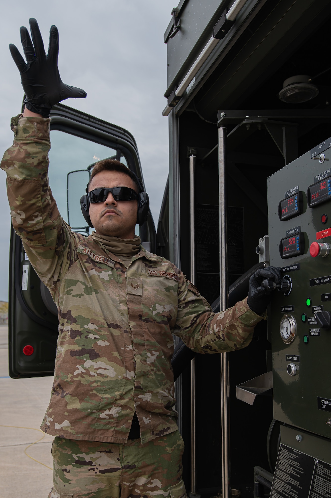 U.S. Air Force Senior Airman Gary Kittrell, 87th Logistics Readiness Squadron fuels service center controller performs hot-pit refueling on an F-16C+ Fighting Falcon.