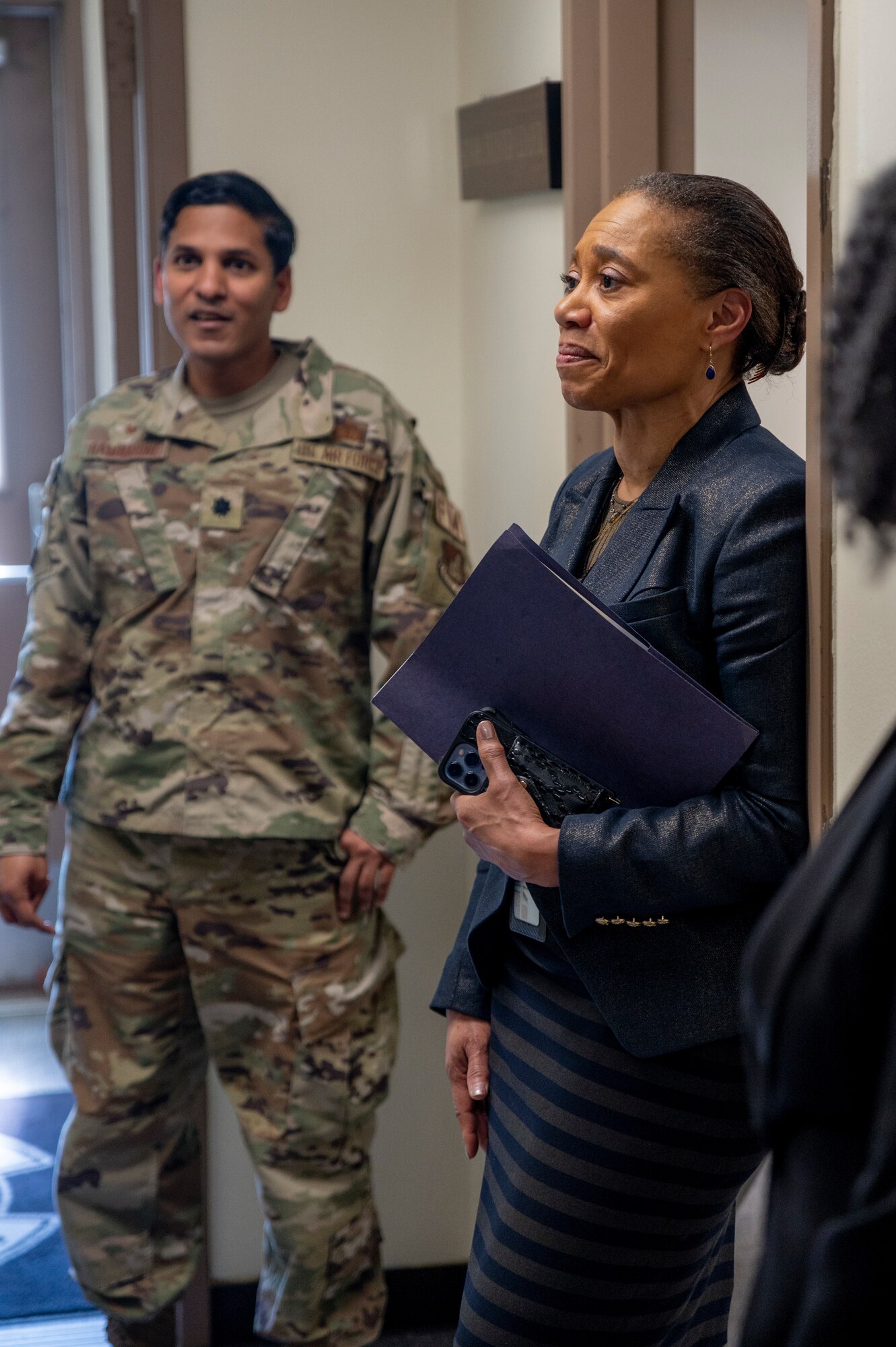 Audrey Davis, Defense Finance and Accounting Service (DFAS) director, speaks with U.S. Air Force Tech. Sgt. Kivan Smith, 51st Comptroller Squadron (CPTS) noncommissioned officer in charge of financial operations, during her visit to the 51st Fighter Wing at Osan Air Base, Republic of Korea, May 1, 2023.
