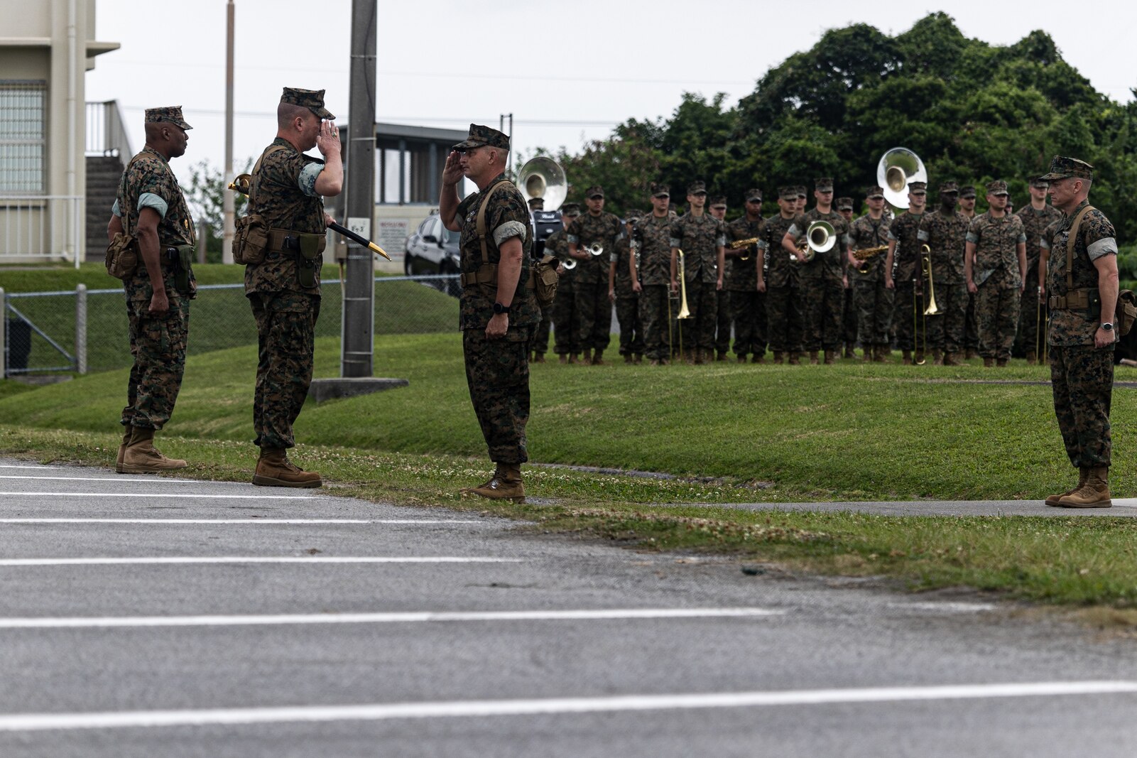 U.S. Navy Command Master Chief Donald O. Leppert, a native of Binghamton, New York salutes U.S. Marine Corps Lt. Gen. James W. Bierman, born in Camp Lejeune, as part of the III Marine Expeditionary Force change of office ceremony on Camp Courtney, Okinawa, Japan, May 4, 2023. U.S. Navy Command Master Chief Curtis D. Blunt, the outgoing command master chief of III MEF, relinquishes his duties to Command Master Chief Donald O. Leppert. (U.S. Marine Corps photo by Cpl. Colton Nicks)