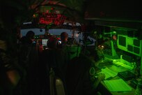 Airmen piloting and navigating a KC-135 Stratotanker assigned to the Ohio Air National Guard prepare for a night landing as part of Operation Hoodoo Sea over South Florida May 1, 2023. The exercise validated minimum force elements using multi-capable Airmen.