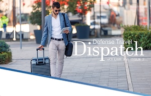 Man walking with suitcase.