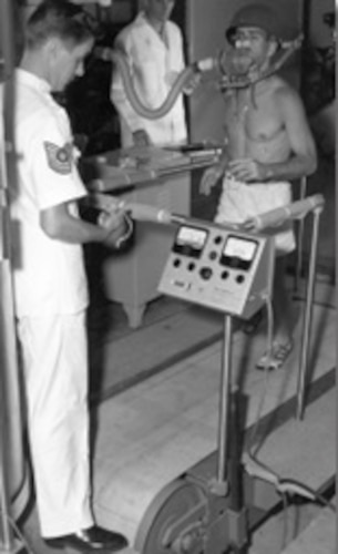 Image of a service member using exercise equipment.