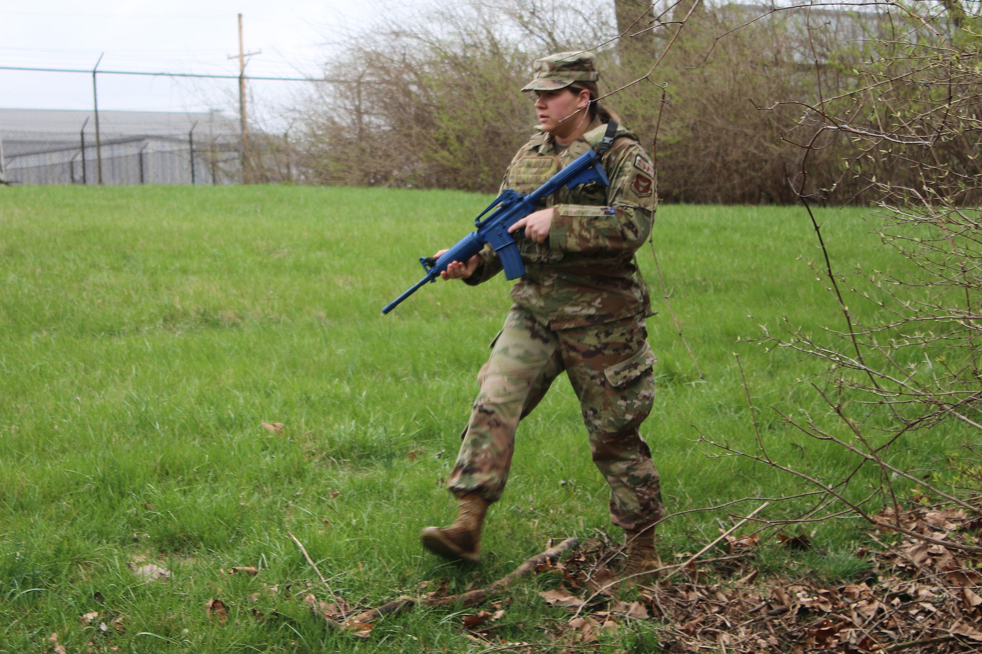 Staff Sgt. Krista Tangent, a defender from the 445th Security Forces Squadron, follows in a file formation during field movement training on April 2, 2023. Despite the wet and cold weather, defenders from the 445th practiced skill such as maneuvers, fire teams, formations, cover and concealment, and critical thinking.