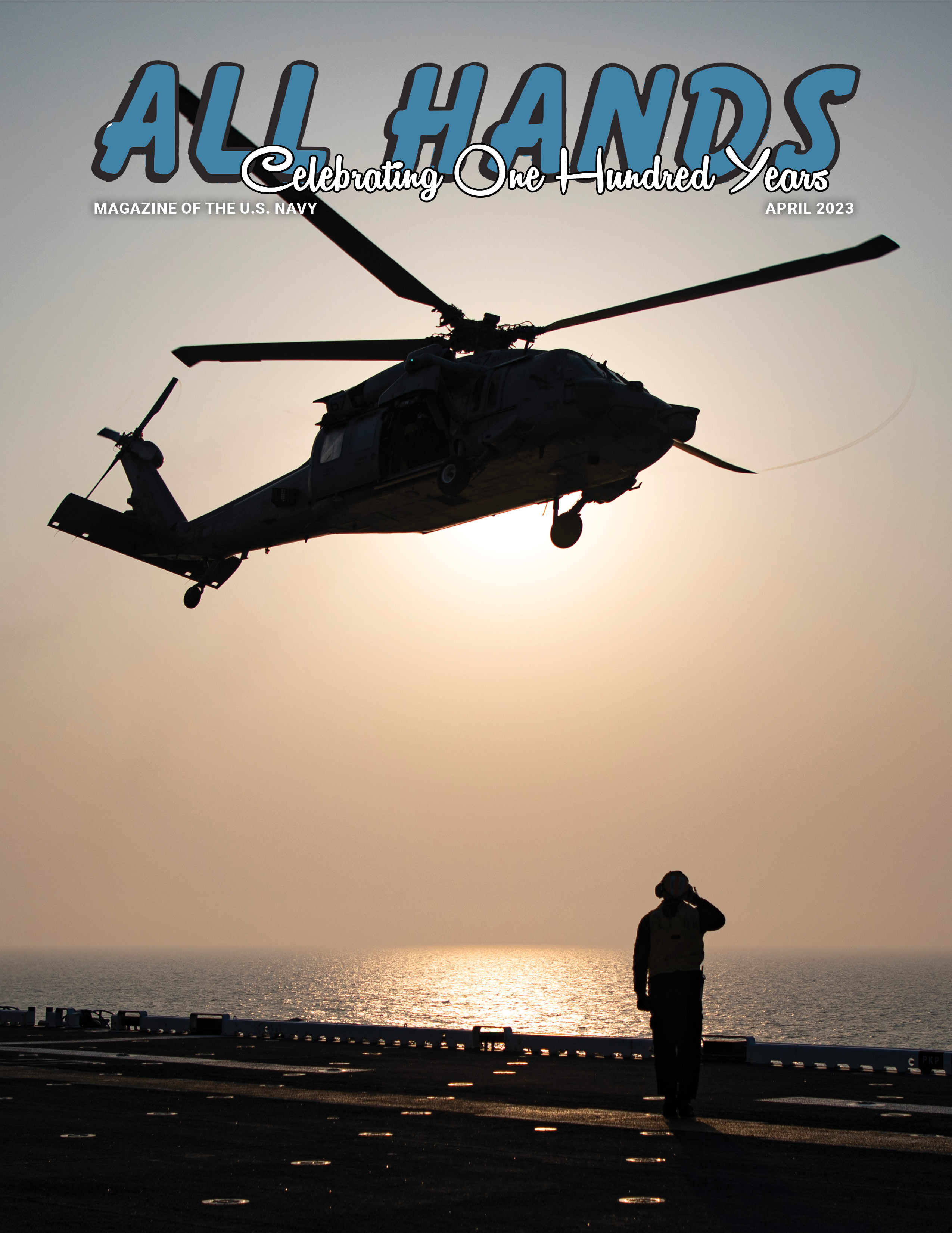 silhouette of sailor saluting as helicopter takes off from ship with sunset in the background 