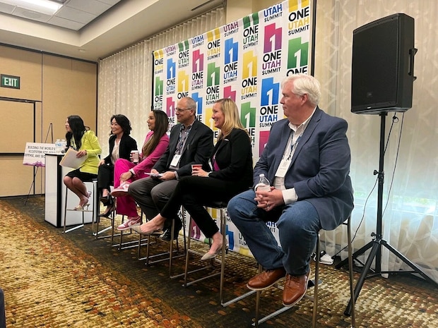 Enos Cummings (far right), 309th Software Engineering Group's engineering director, participates on a Industry and Defense panel at the One Utah Summit May 1 at the Davis Conference Center. The focus of the discussion was "Building the World's Premier Ecosystem for Aerospace, Defense, and Security Companies."