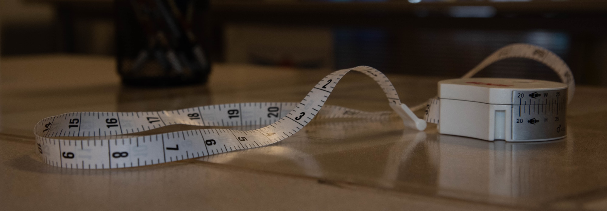A tape measure is unrolled