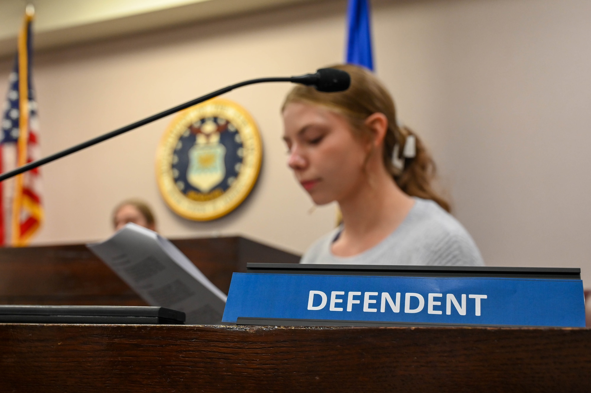 An identification tag is displayed during a mock trial on National Law Day at Altus Air Force Base, Oklahoma, May 1, 2023. National Law Day provides an opportunity to understand how law and the legal process protect liberty, strive to achieve justice and contribute to the freedoms that all Americans share. (U.S. Air Force photo by Senior Airman Trenton Jancze)