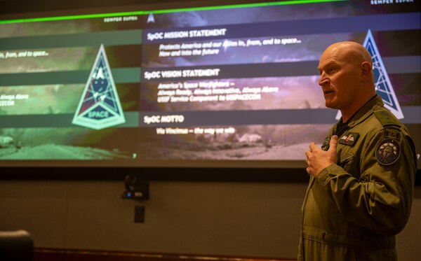 Royal Canadian Air Force Brig. Gen. Kyle C. Paul, Deputy Commanding General, Transformation, Space Operations Command, delivered a mission brief to 22 International Visitor Leadership Program participants at SpOC Headquarters, Peterson Space Force Base, Colo., April 14, 2023. Paul briefed the IVLP on SpOC’s mission and familiarized attendees with Space Force structure. (US Space Force photo by SSgt Jose A. Rodriguez Jr)