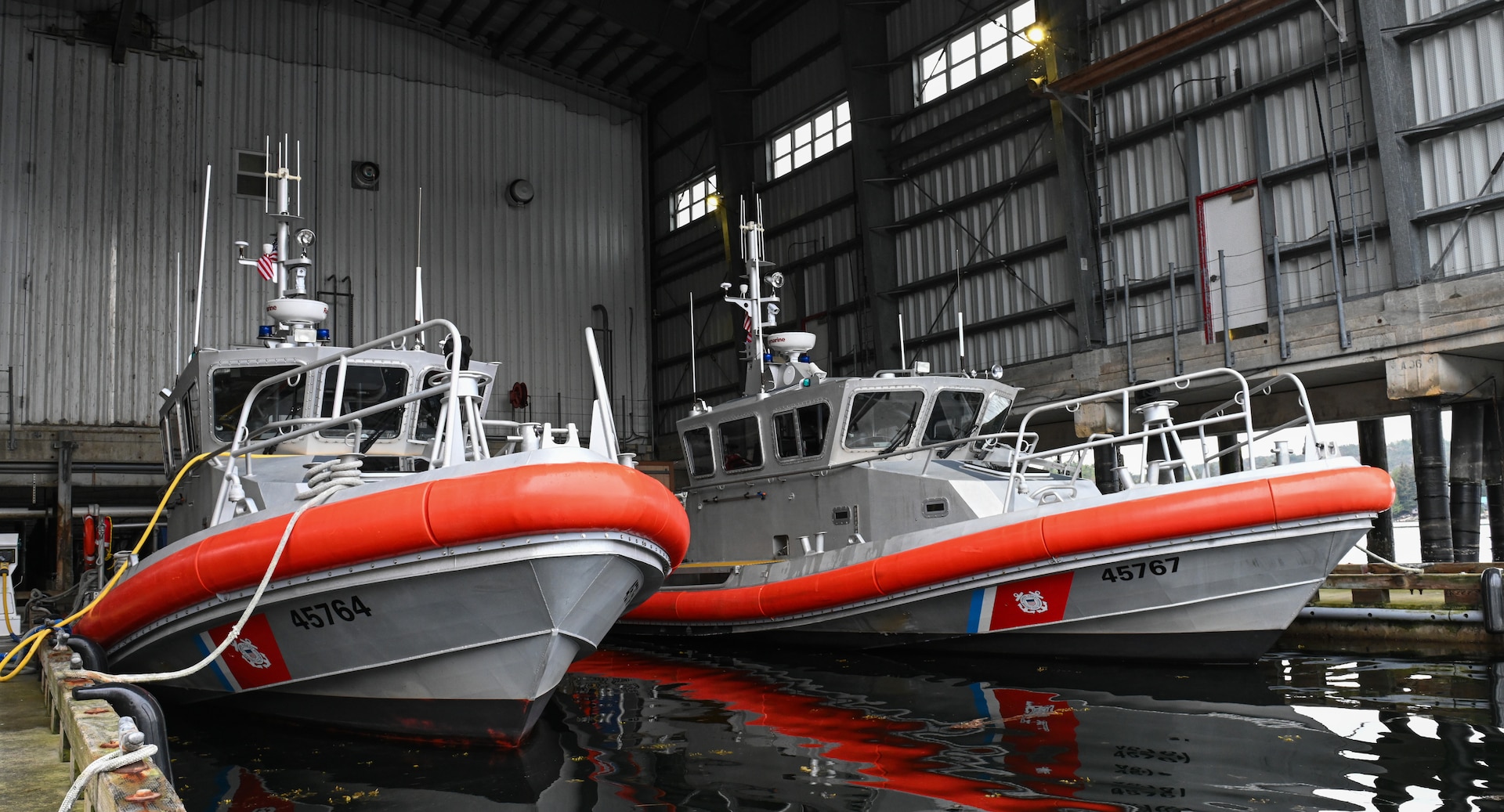 Two Coast Guard 45-foot Response Boats-Medium are photographed moored at Coast Guard Station Ketchikan, Alaska, April 28, 2023. Station Ketchikan is equipped with two 29-foot Response Boats-Small and two 45-foot Response Boats-Medium which are used to carry out missions throughout southeastern Alaska such as law enforcement, living marine resources enforcement and search & rescue. U.S. Coast Guard photo by Petty Officer 3rd Class Ian Gray.