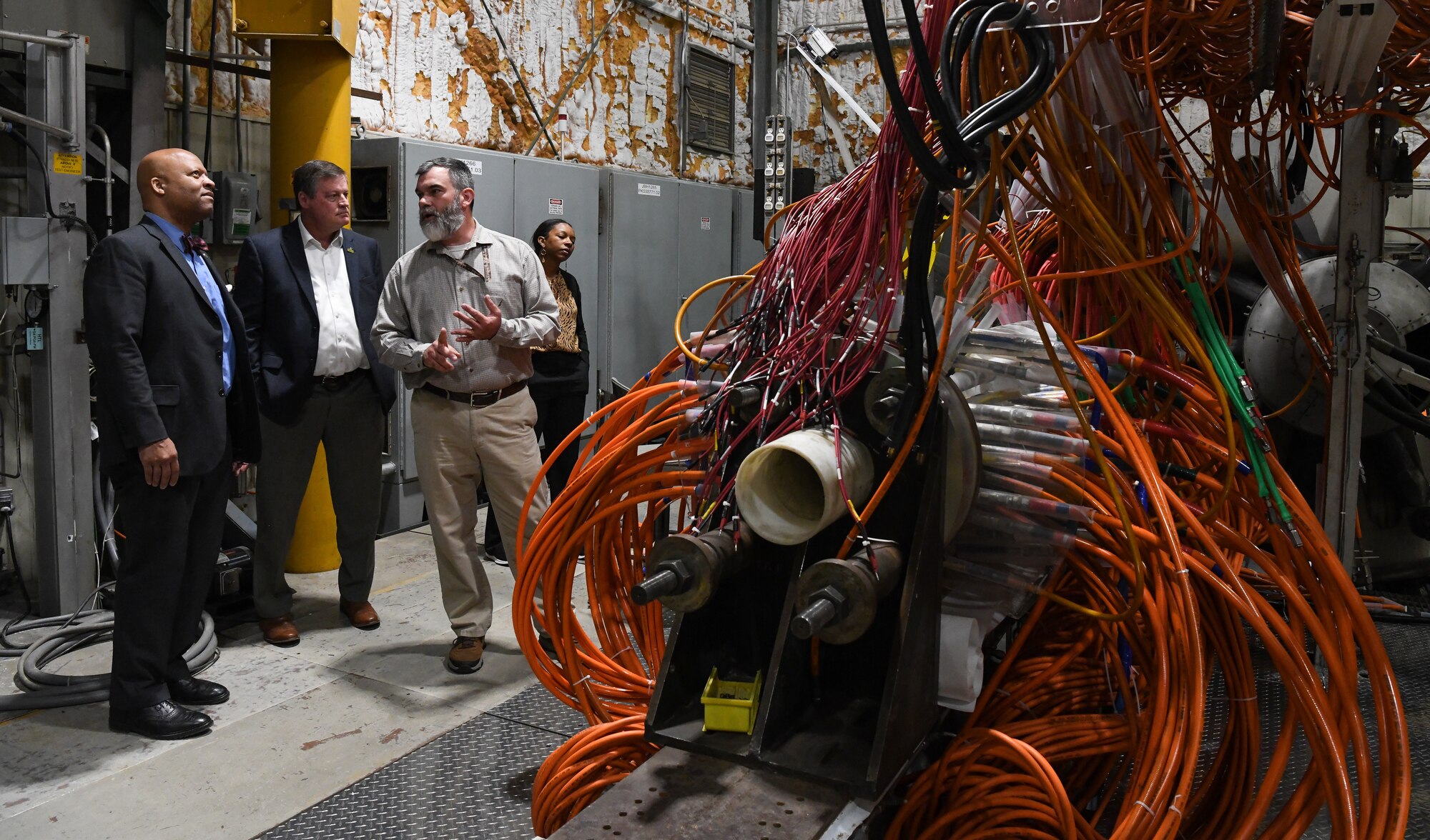 Group standing next to arc heater