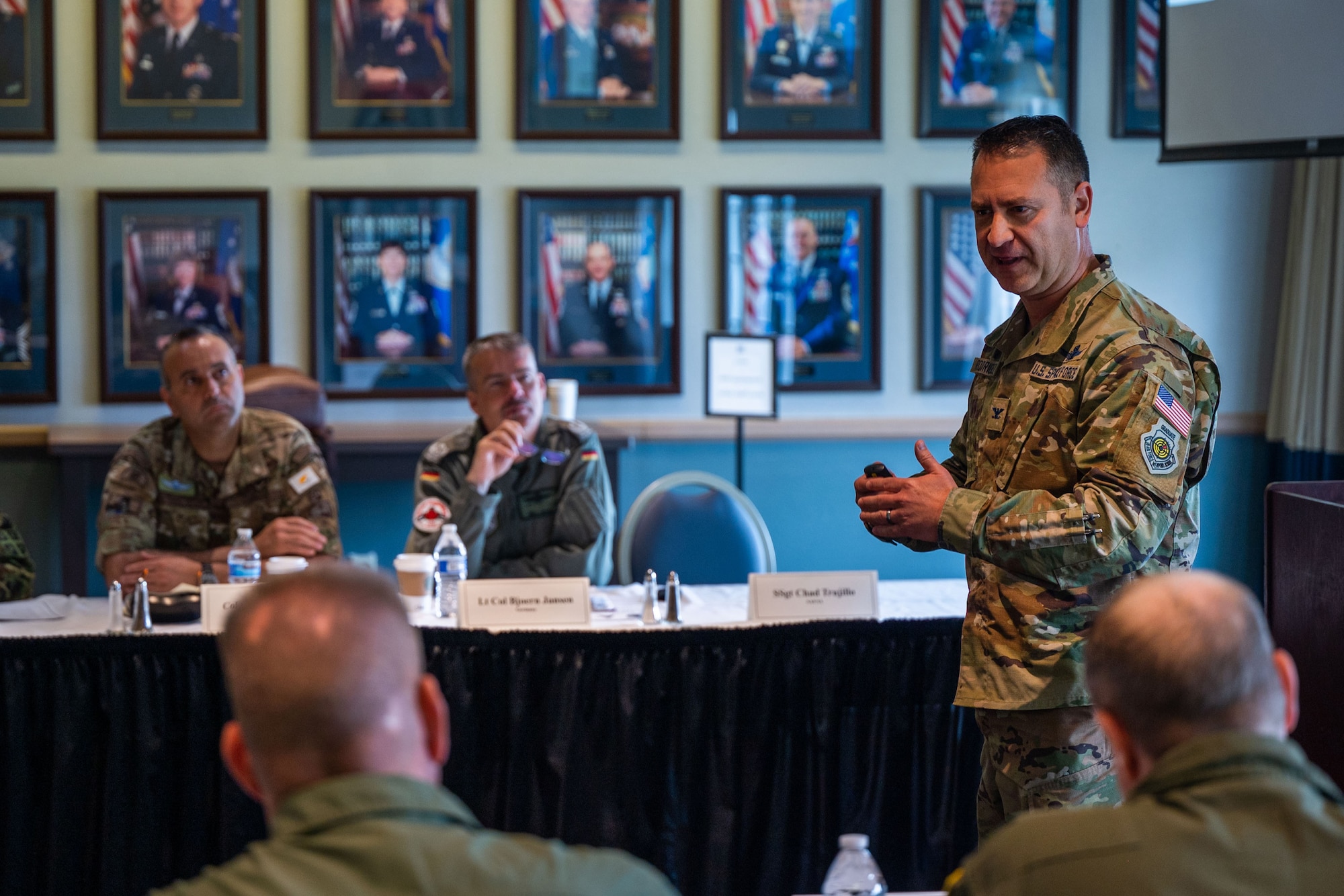 U.S. Space Force Col. Anibal Rodriguez, Space Delta 5 deputy commander, mission brief to Foreign Air Attachés at the Pacific Coast Club on Vandenberg Space Force Base, Calif., May 3, 2023. Hosted by CFSCC, the group was part of a Secretary of the Air Force International Affairs (SAF/IA)-sponsored tour for D.C.-based Foreign Air Attachés from 15 different countries. Led by U.S. Air Force Maj. Gen. Julian C. Cheater, Assistant Deputy Under SAF/IA, this DoD-level program aims to orient Attachés to DoD organizations and provide strategic messaging to senior foreign leaders, and is executed on behalf of the USAF Chief of Staff Gen. Charles Q. Brown. (U.S. Space Force photo by Tech. Sgt. Luke Kitterman)