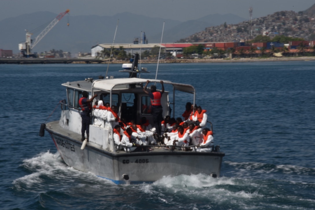 Coast Guard Cutter Campbell (WMEC 909) and crew repatriates 81 Haitians to Cap-Haitian, Haiti, May 3, 2023. Coast Guard crews interdicted a Haitian vessel approximately 40 miles north of Ile de la Tortue, Haiti, May 1, 2023. (U.S. Coast Guard photo)