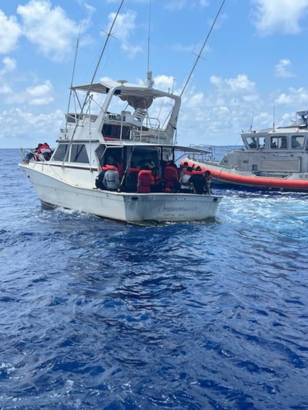 A U.S. Coast Guard Sector Miami boat crew prepares to interdict a pleasure craft about 35 miles southeast of West Palm Beach, Florida, April 27, 2023. Fifty-four people were transferred to Bahamian authorities May 3, 2023. (U.S. Coast Guard
photo)