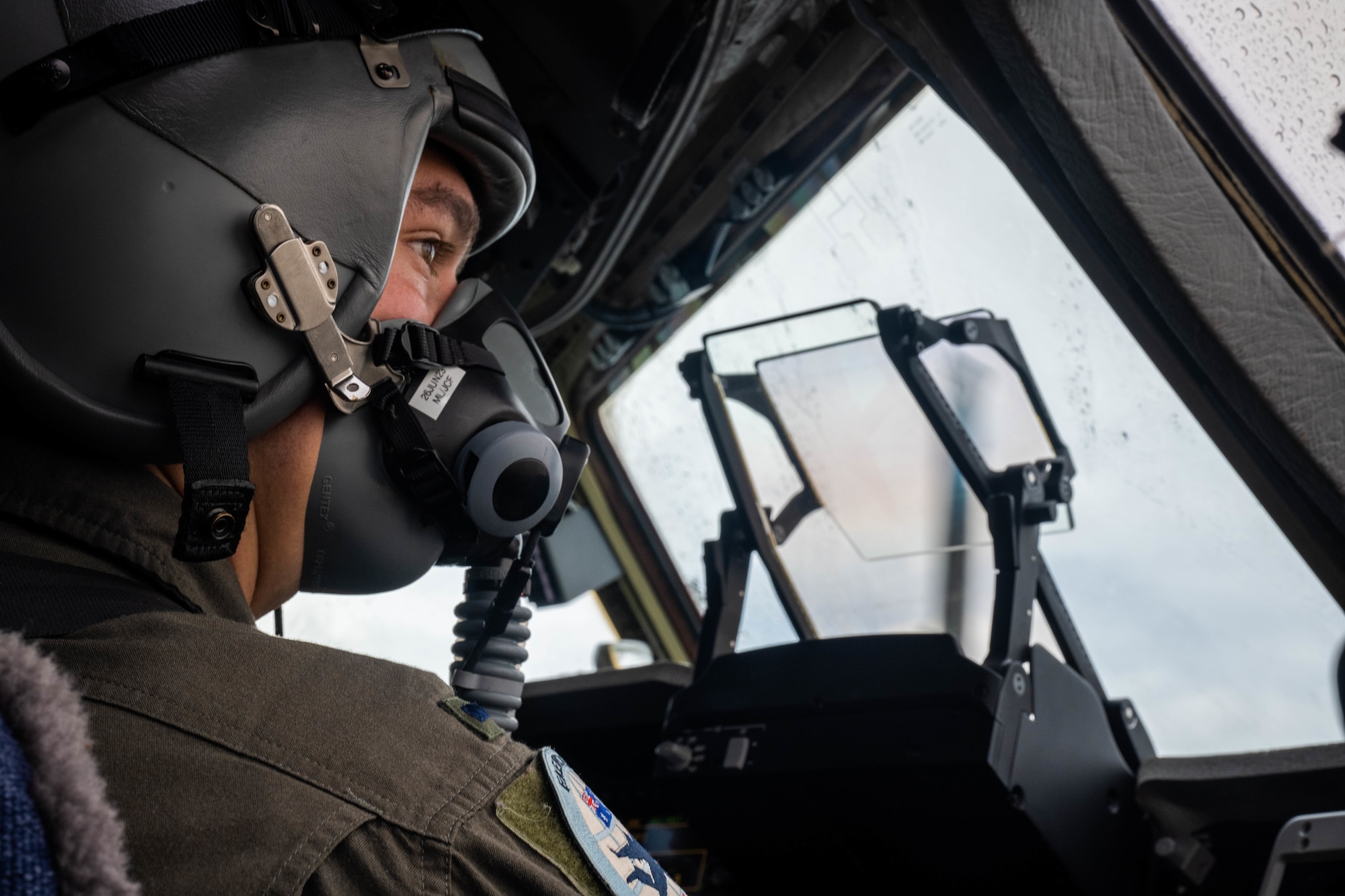 U.S. Air Force 1st Lt. John Gogal, 535th Airlift Squadron pilot, prepares for a high-altitude airdrop for Global Dexterity 23-1 during a training flight in the skies of Australia, April 27, 2023. This exercise is designed to help develop the bilateral tactical airlift capabilities of the U.S. Air Force and the Royal Australian Air Force and learn from each other to strengthen partnerships in the Indo-Pacific region. (U.S. Air Force photo by Senior Airman Makensie Cooper)