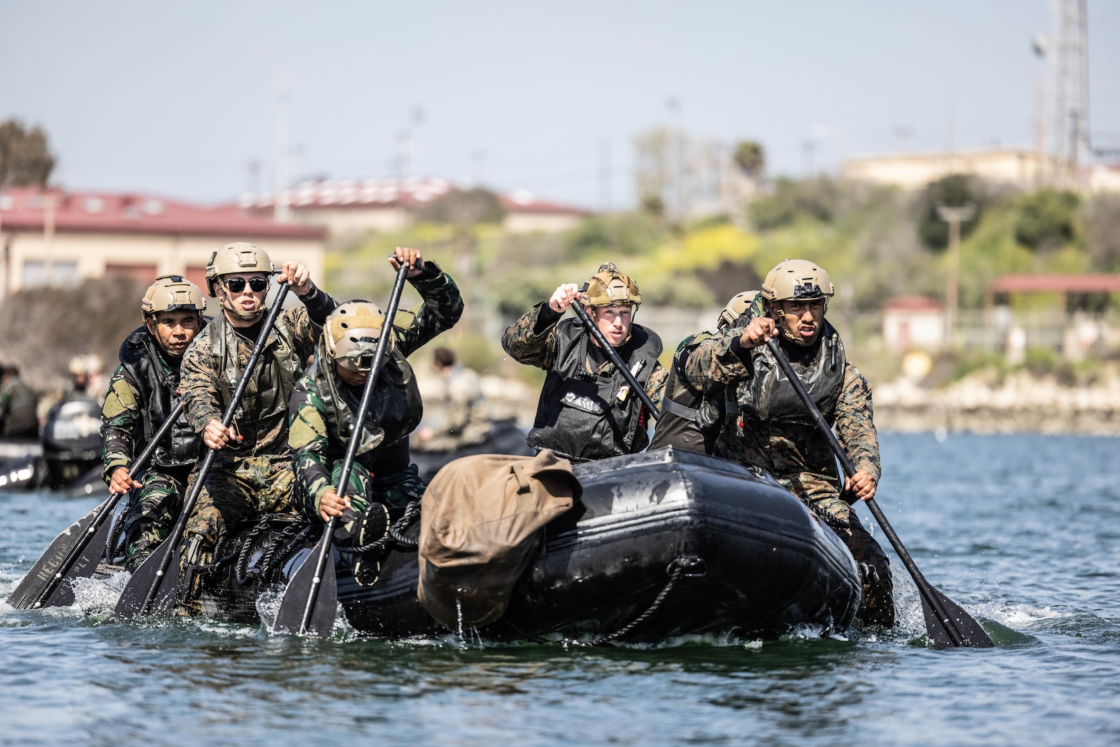 U.S. Marines with 2nd Platoon, Charlie Company, 1st Reconnaissance Battalion, 1st Marine Division, and members of the 2nd Intai Amfibi Battalion, Indonesian Korps Marinir, paddle back to shore on a combat rubber raiding craft during a reconnaissance exercise at Marine Corps Base Camp Pendleton, California, April 15, 2023. The Marines of 1st Recon Bn. host the bilateral training exercise annually to foster a spirit of cooperation and mutual respect between Indonesian service members and 1st MARDIV Marines and promote cultural exchange and understanding.