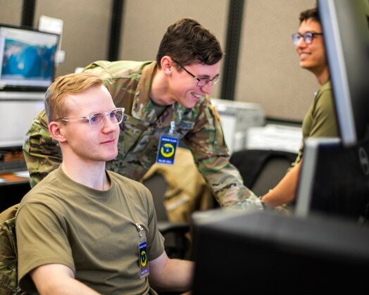  U.S. Space Force Guardians work together during SPACE FLAG 23-2 at Schriever Space Force Base, Colorado, April 27, 2023. SPACE FLAG 23-2 was the largest exercise iteration to date, involving 250 participants. It was also the most complex integration of cyber warfare, the largest integration of coalition partners ever at a SPACE FLAG exercise, and the first SPACE FLAG exercise to feature live-fire space electronic warfare. (U.S. Space Force photo by Judi Tomich)