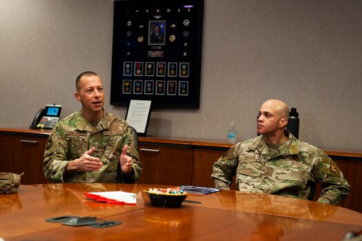 Chief Master Sgt. Carlos Labrador, National Air and Space Intelligence Center command chief, welcomes Chief Master Sgt. Lloyd Morales, 88th Air Base Wing command chief, at the kickoff of his immersion tour here, Wright-Patterson Air Force Base, Ohio, April 10, 2023. Visits such as this one, help bolster the already strong relationship NASIC has with the 88th ABW.