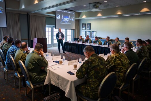  Mr. William P. Thompson, Combined Force Space Component Command (CFSCC) deputy chief of staff, leads a CFSCC mission brief to Foreign Air Attachés at the Pacific Coast Club on Vandenberg Space Force Base, Calif., May 3, 2023. Hosted by CFSCC, the group was part of a Secretary of the Air Force International Affairs (SAF/IA)-sponsored tour for D.C.-based Foreign Air Attachés from 15 different countries. Led by U.S. Air Force Maj. Gen. Julian C. Cheater, Assistant Deputy Under SAF/IA, this DoD-level program aims to orient Attachés to DoD organizations and provide strategic messaging to senior foreign leaders, and is executed on behalf of the USAF Chief of Staff Gen. Charles Q. Brown. (U.S. Space Force photo by Tech. Sgt. Luke Kitterman)