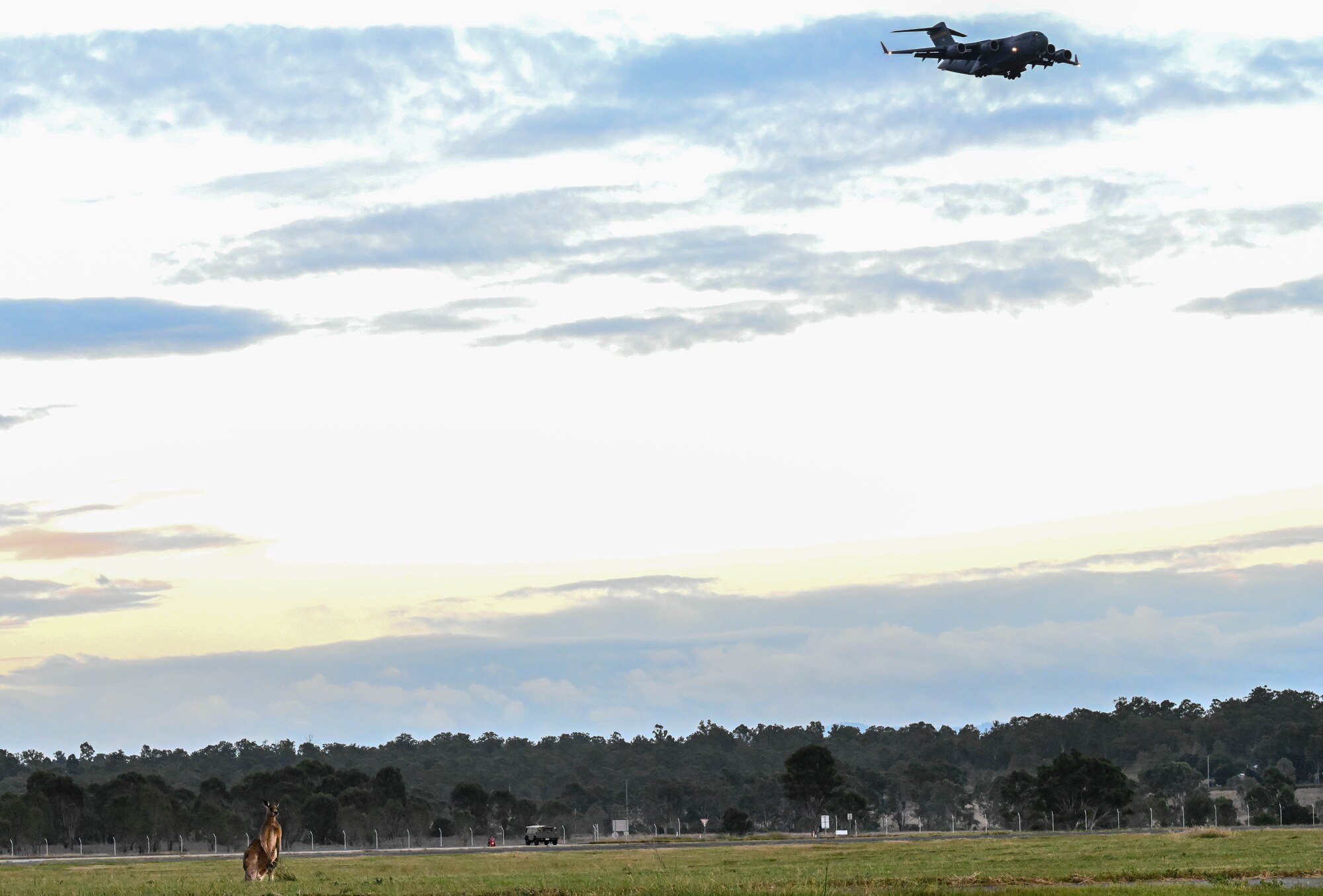 A U.S. C-17 Globemaster III conducts touch and goes during a scheduled training flight during Exercise Global Dexterity 23-1 at Royal Australian Air Force Base Amberley, Queensland, Australia, April 25, 2023. Exercise Global Dexterity 2023 is being conducted at RAAF Base Amberley, and is designed to help enhance air cooperation between the U.S. and Australia and increase our combined capabilities, improving security and stability in the Indo-Pacific Region. (U.S. Air Force photo by Senior Airman Makensie Cooper)