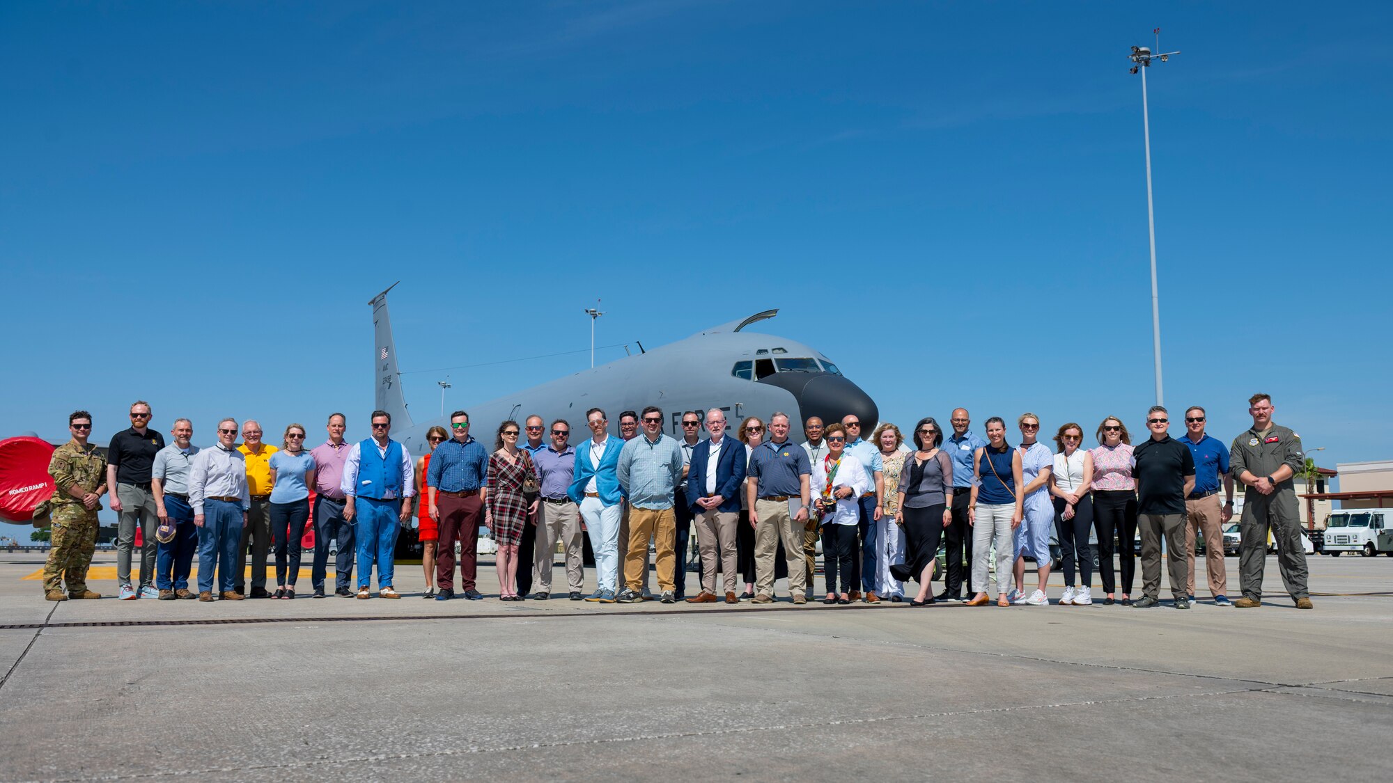 A group of civic leaders from the Nashville Chamber of Commerce pose with service members assigned to the 50th Air Refueling Squadron for a photo near a KC-135 Stratotanker at MacDill Air Force Base, Florida, May 4, 2023. The group toured the base to gain a better understanding of military operations and the best ways to support service members in their local community. (U.S. Air Force photo by Senior Airman Lauren Cobin)